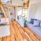 Tiny house interior journey giant wheels room living materials inside traveling mini couple list space dog country their builds plans